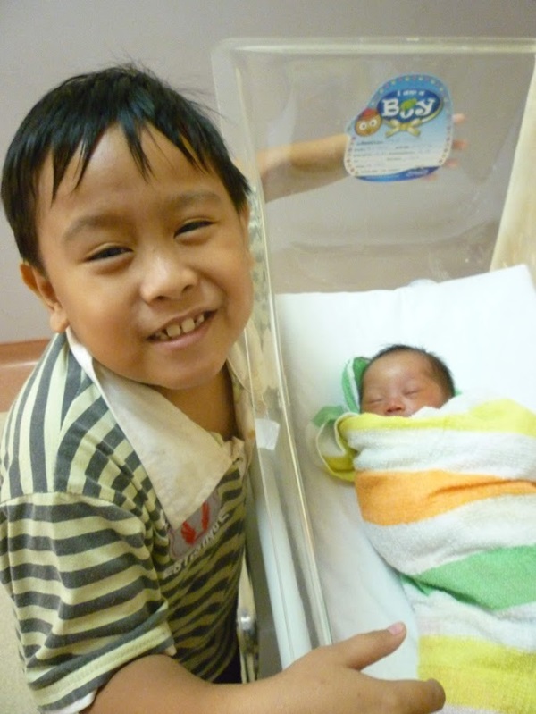 Big Bro Eric and Newborn Baby Bro Edry